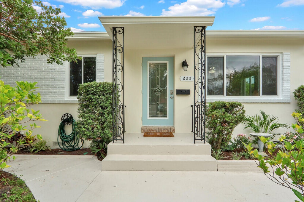 Photo of 222 Bayberry Drive, Lake Park, FL 33403 (MLS # B26042419)