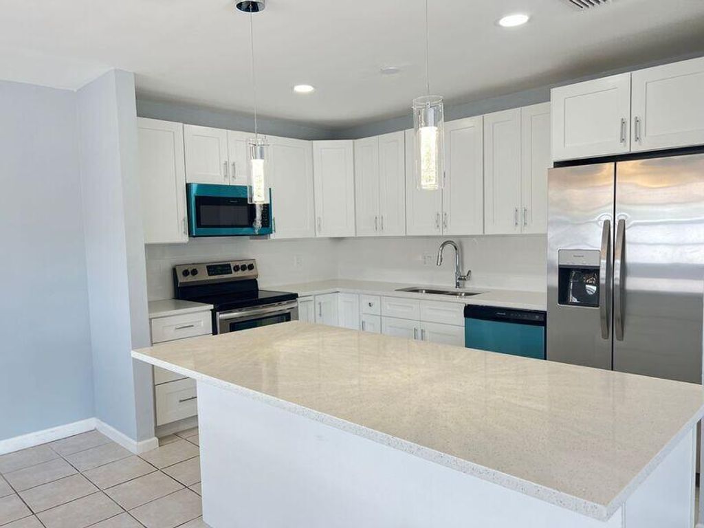 Photo of 556 Holly Drive #A, Palm Beach Gardens, FL 33410 (MLS # R11107780)