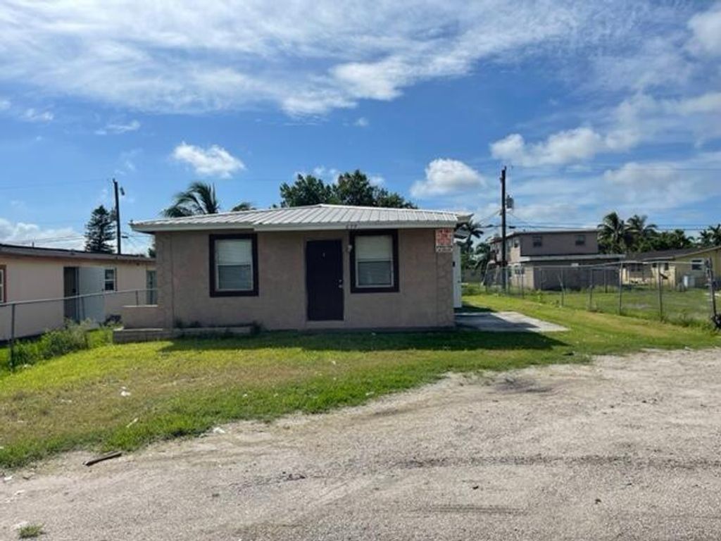 Photo of 639 SW 5th Street #1, Belle Glade, FL 33430 (MLS # R10937375)