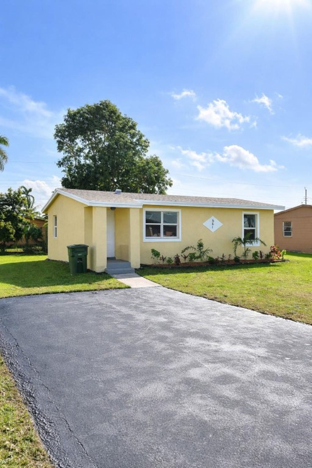 Photo of 561 14th Street, Belle Glade, FL 33430 (MLS # F10540898)