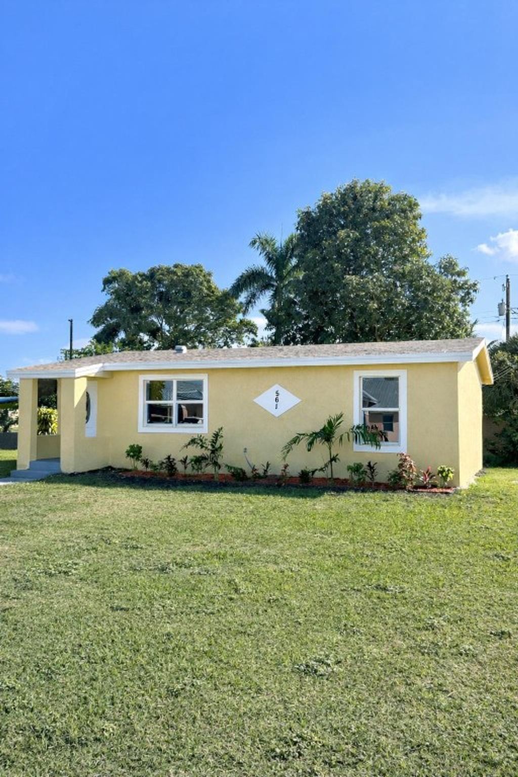 Photo of 561 14th Street, Belle Glade, FL 33430 (MLS # F10540898)