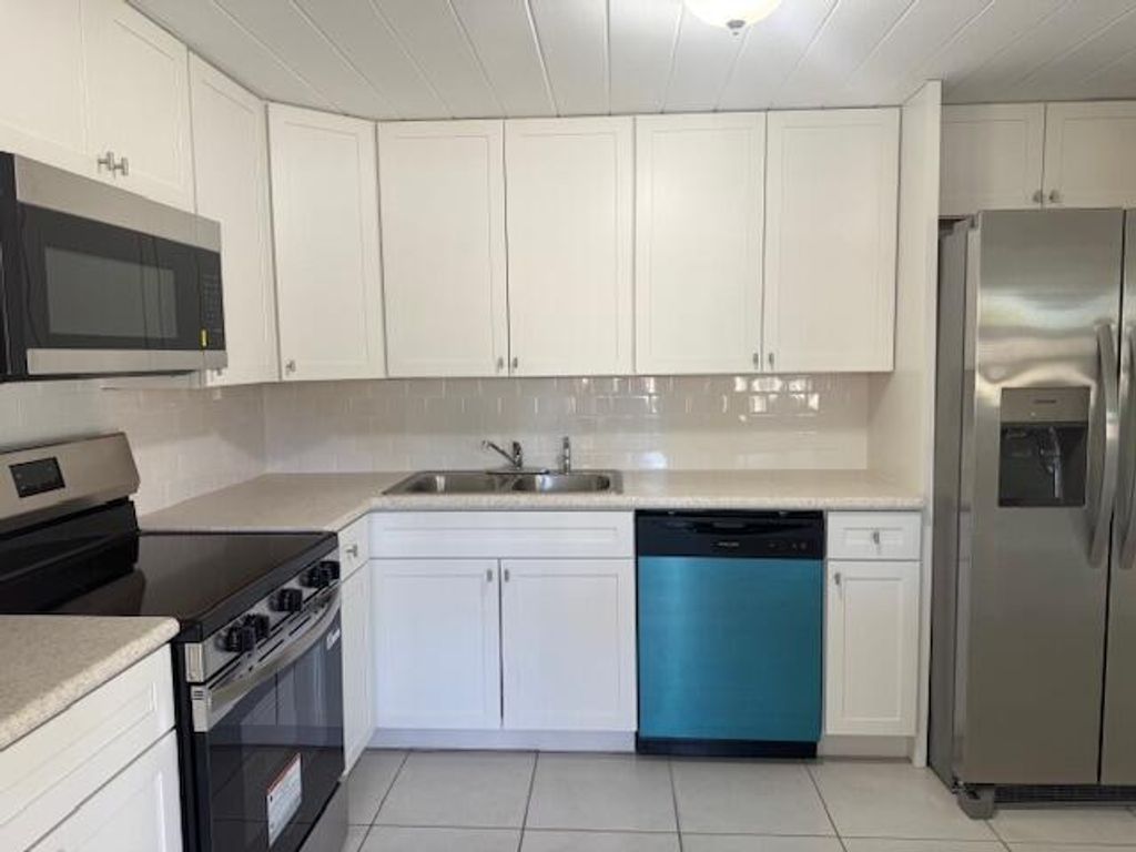 Photo of 2422 Sunset Drive, West Palm Beach, FL 33415 (MLS # R11160767)