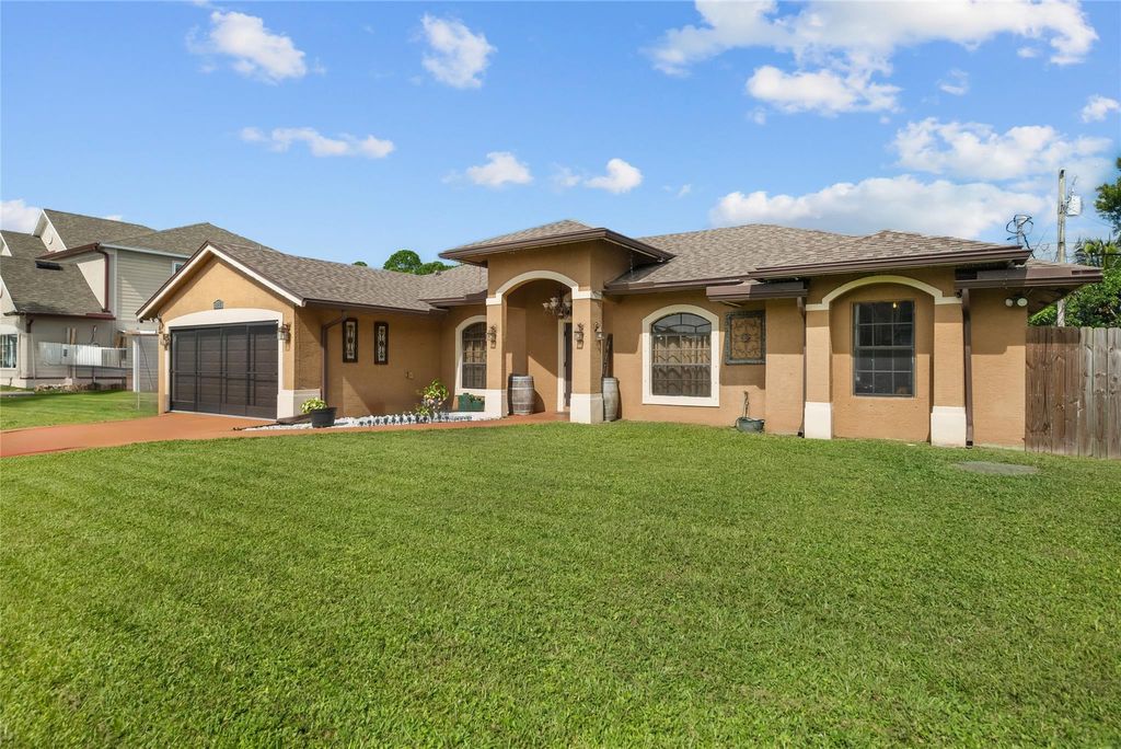 Photo of 1889 SW Whipple Avenue, Port Saint Lucie, FL 34953 (MLS # F10408468)