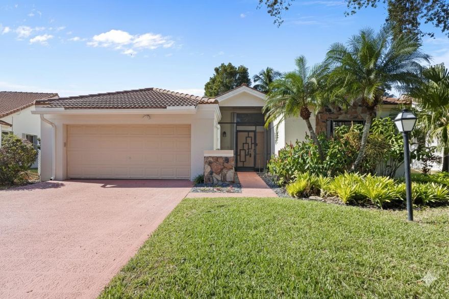 South Florida Lakefront paradise! This SFH offers 3 bd, 2 baths, 2 CG w/approx 2100 sqft under air. Foyer offers double door entry leading into LR w/vaulted ceiling & tile flooring, from the LR leads into the kitchen w/, SS appliances, raised panel cabinetry, solid surface countertops & pantry w/ample storage! NEW LVP flooring in Kitchen, Dining & Family Room. Kitchen is open to dining room w/built-in buffet perfect for hosting. Family room w/ 2 sliders out to a covered screened-in patio overlooking the tranquil water views. Primary Suite offers newer carpeting & views of the lake, w/HUGE walk-in closet & ensuite w/roman tub, step in shower & dual sinks PLUS skylight for natural light. Front private guest bedroom w/newer carpeting, guest bath w/recently resurfaced tub, see more