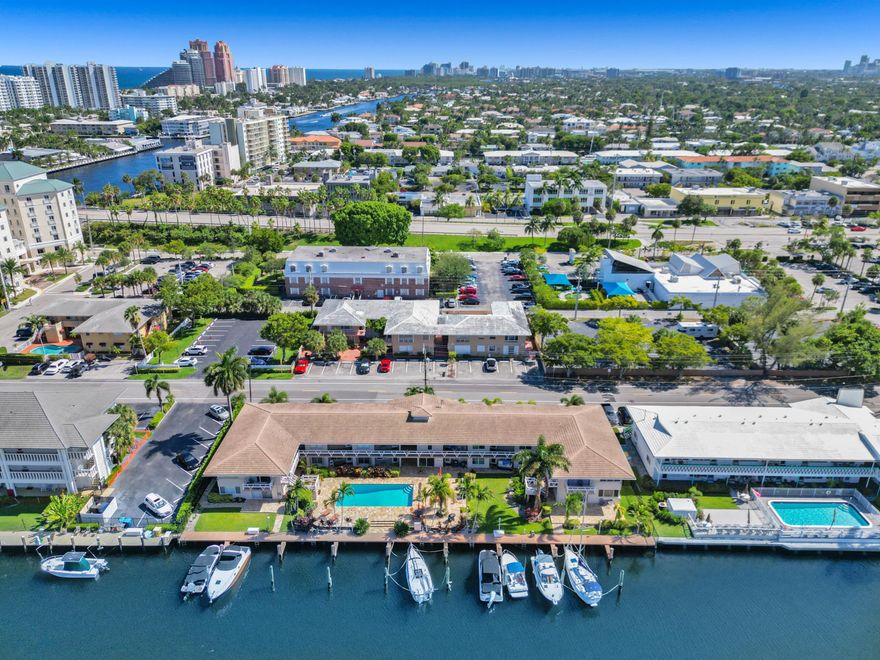 Enjoy breathtaking waterfront views from this beautiful residence offering the ultimate in coastal living! This property features a HUGE patio—perfect for entertaining or relaxing. Boating enthusiasts will appreciate the dock availability (additional cost) accommodating vessels up to 30' with no fixed bridges. Inside, you'll find a stylish interior with stainless steel appliances, elegant marble flooring and bath, and sleek granite countertops. The versatile second bedroom includes a built-in office that can remain or be removed to suit your needs. Ideally located within walking distance to the beach, restaurants, shopping, and a dine-in theater—everything you need is right at your doorstep. Waterfront living at it's finest! Boat Dock Available