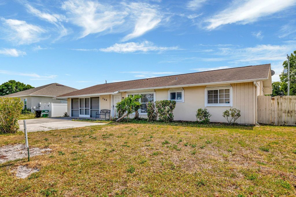 Photo of 566 SE Floresta Drive, Port Saint Lucie, FL 34983 (MLS # R11084274)