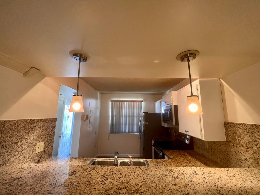 Photo of 3515 Village Boulevard #402, West Palm Beach, FL 33409 (MLS # R11054652)