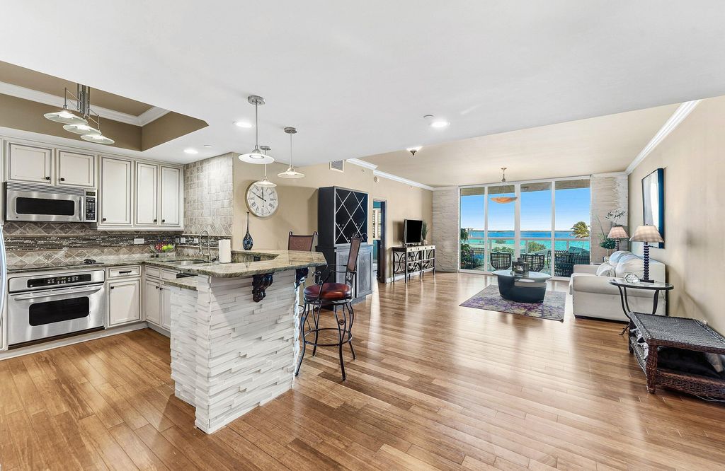 Photo of 2650 Lake Shore Drive #401, Riviera Beach, FL 33404 (MLS # B26021430)