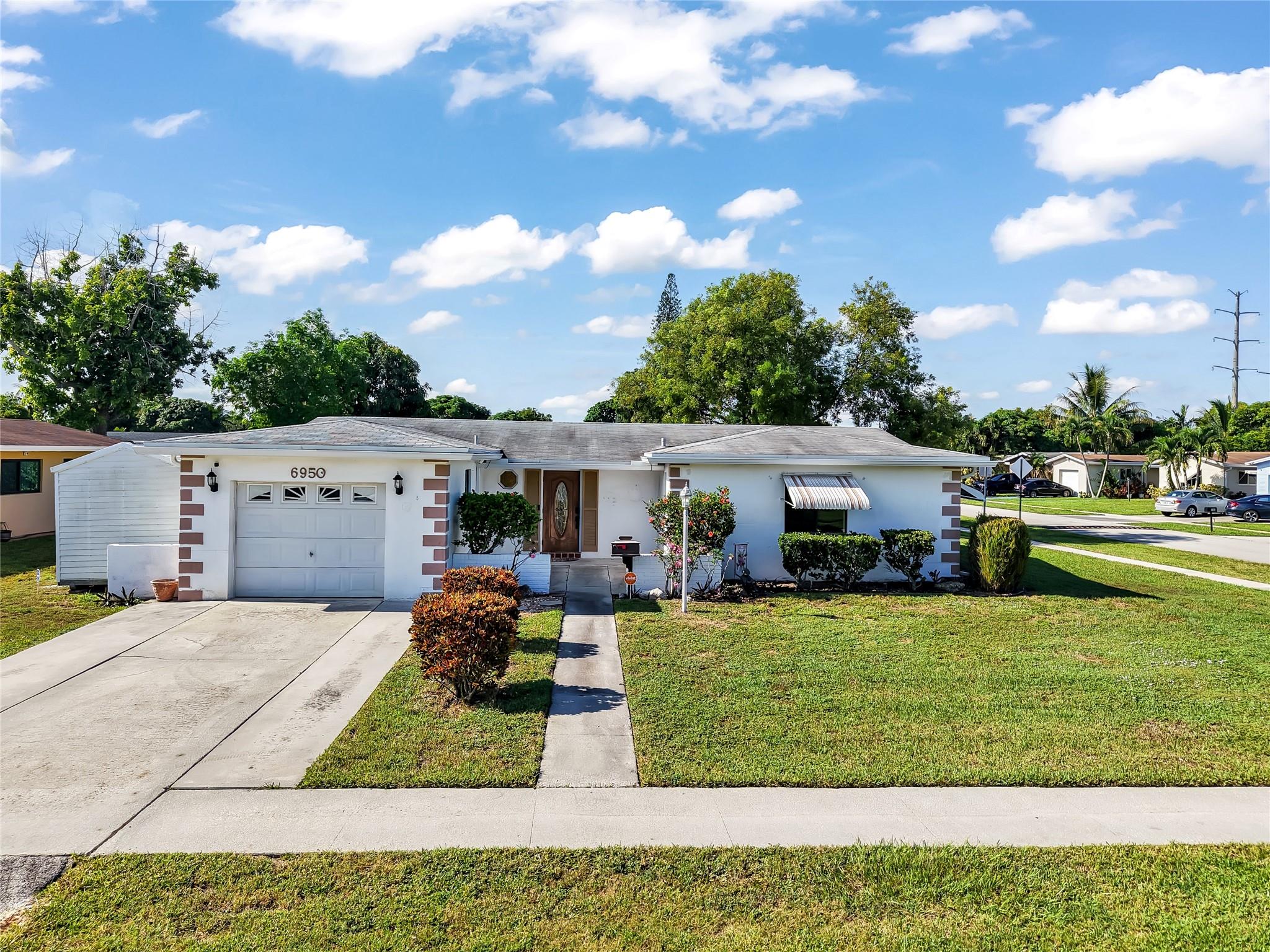 Discover the largest 4bed, 2bath layout on the market! This spacious corner-lot home with 1-car garage, loads of updates & NO HOA RESTRICTIONS offers the freedom to truly make it your own. Step inside to find a bright, freshly painted interior, a modern eat-in kitchen with newer appliances, pantry & multiple living areas filled with natural light. Split floorplan offers privacy & comfort, with the primary suite tucked away off the family room & 3 bedrooms thoughtfully separated. Outdoors, design your own tropical retreat with room for pool/patio & lush landscaping, while the oversized side yard easily allows for boat/RV/toys!
2020 ROOF! Conveniently located close to major highways, schools, shopping & dining! Don’t miss your chance, come see it today and fall in love!