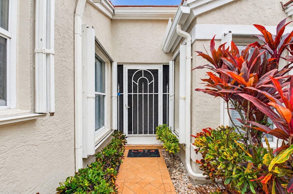 Photo of 5726 Royal Lake Circle, Boynton Beach, FL 33437 (MLS # B26093946)