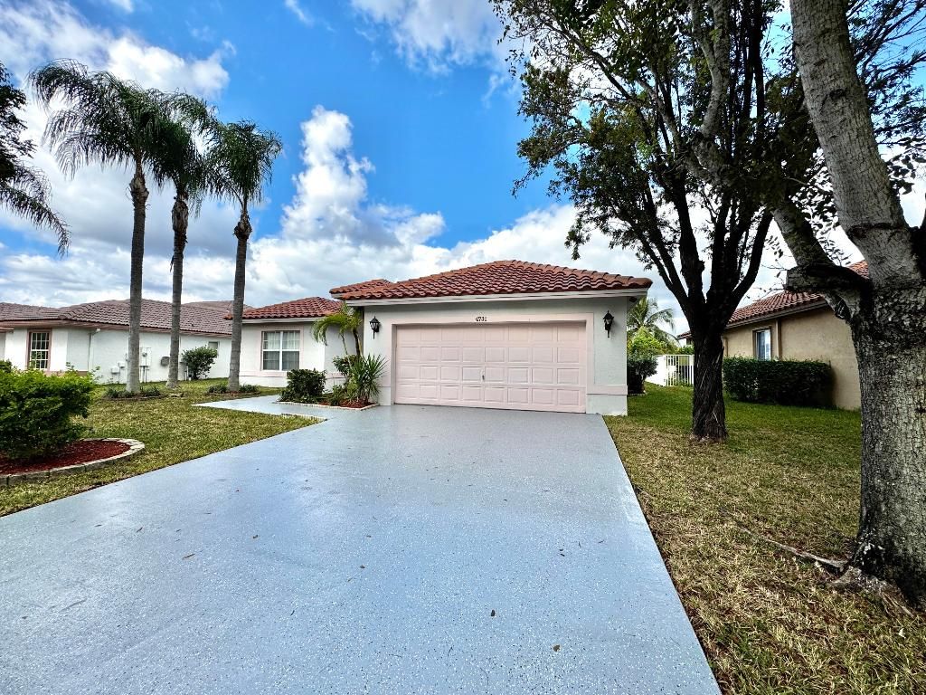 Photo of 4731 NW 75th Street, Coconut Creek, FL 33073 (MLS # R11042977)
