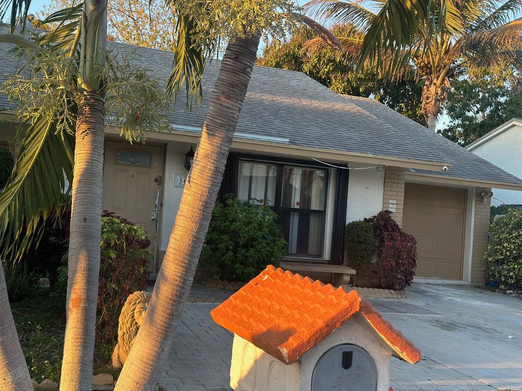 Photo of 5654 E Ithaca Cir Circle E, Lake Worth, FL 33463 (MLS # B26009855)