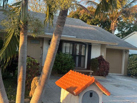 Photo of 5654 E Ithaca Cir Circle E, Lake Worth, FL 33463 (MLS # B26009855)