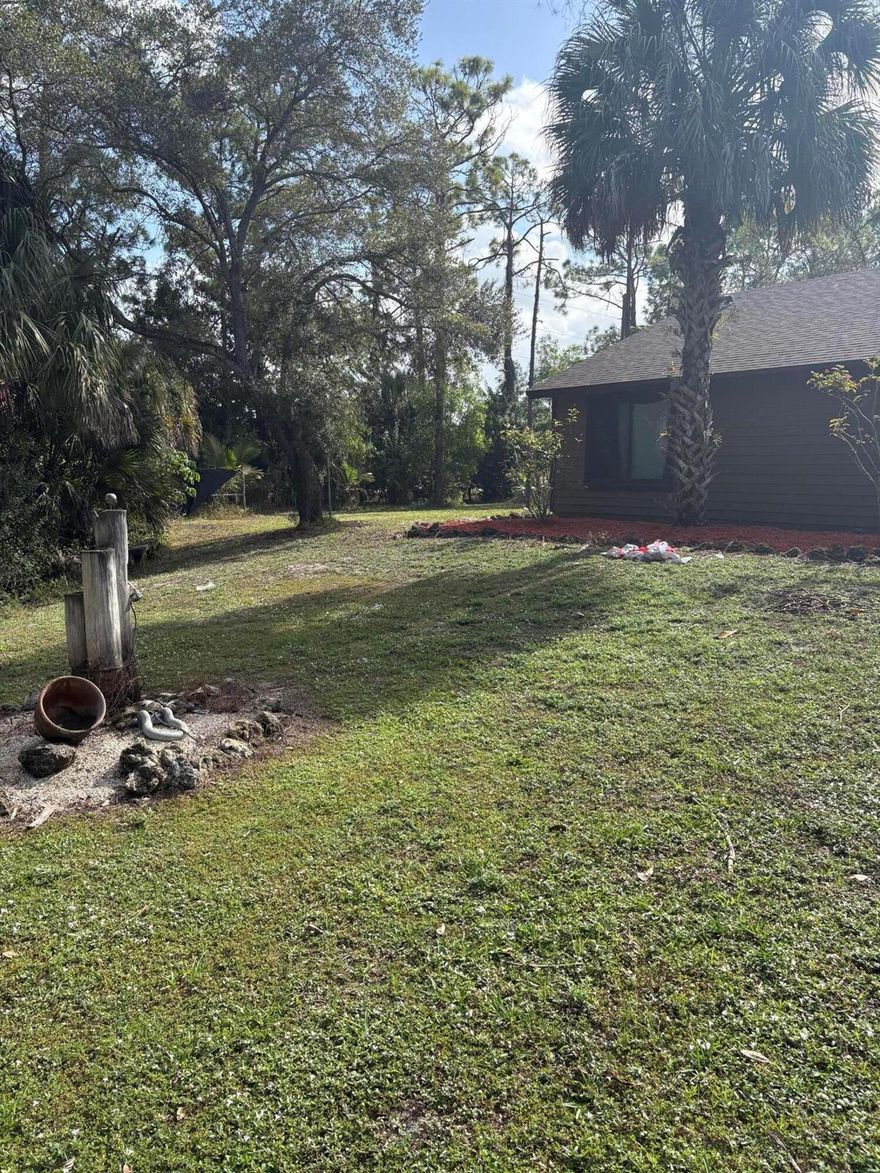 Welcome to this spacious 4-bedroom, 2-bath home on nearly 2 acres in desirable Loxahatchee and No HOA! Recent upgrades include a new roof, hurricane-impact low E windows and sliders, remodeled master shower, and newer AC unit.  The open floor plan freshly painted bedrooms create a great and inviting space.  Outdoors - enjoy a wraparound sidewalk and an above-ground pool and a huge fire pit. Again No HOA, quiet neighborhood, and plenty of space for future enhancements - bring your vision and make this property truly yours!