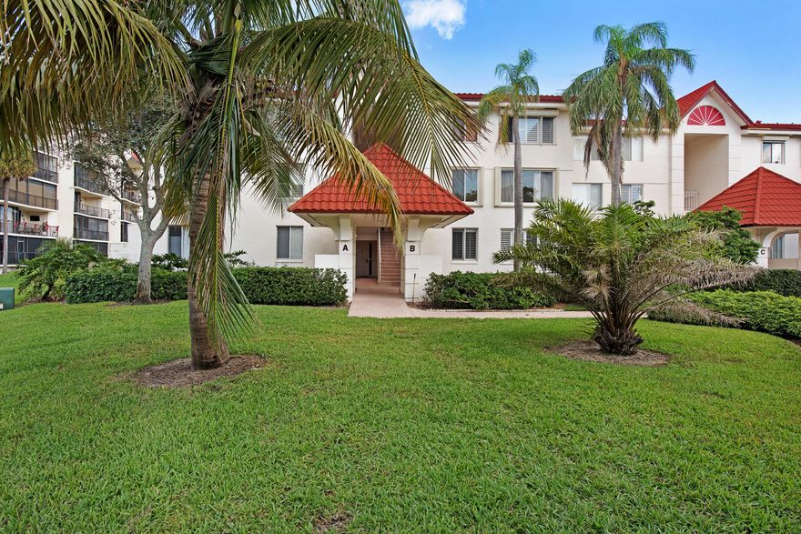 Stunning water views from your 32' screened balcony which runs length of the living and dining rooms. This 3/2 Coastal Living condo has an open floor plan with private foyer entrance. Hardwood flooring throughout unit. Porch has tumbled marble floors. Built-in bookcases and cabinets in living room. Granite counter tops in kitchen. Computer-nook at end off dining area. European-styled gated complex is direct Intracoastal, move-in ready and close to shopping & I-95.  It has two pools, three tennis courts, bike trails and ample parking.