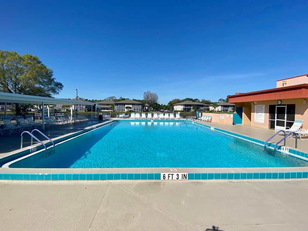 Photo of 26 Lake Vista Trail E #201, Port Saint Lucie, FL 34952 (MLS # R11151424)