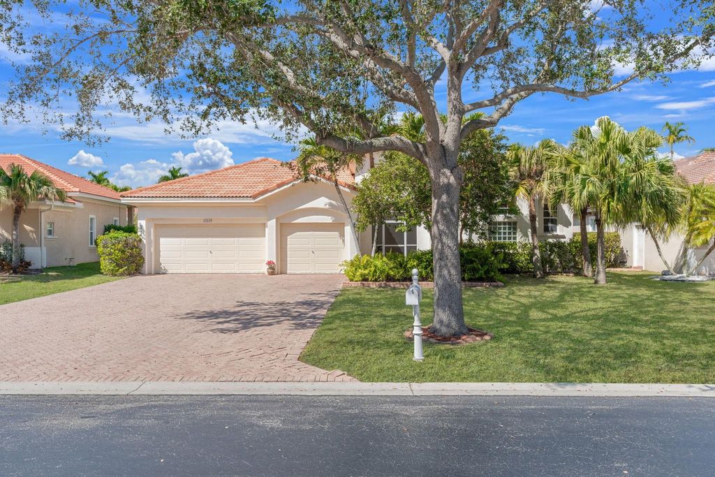 Photo of 12239 NW 49th Drive, Coral Springs, FL 33076 (MLS # F10551947)