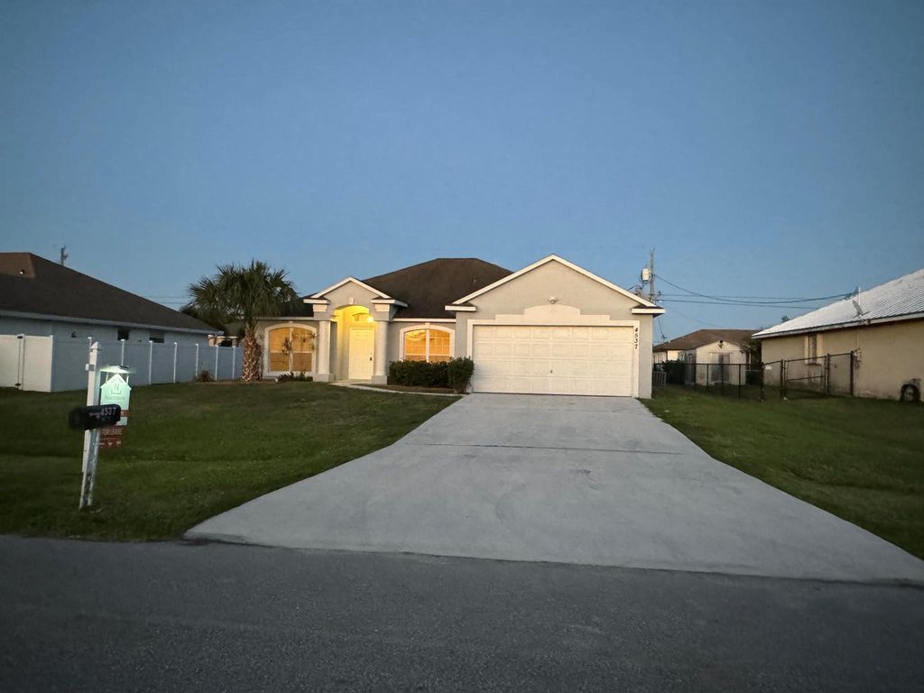 Photo of 4537 SW Rachel Street, Port Saint Lucie, FL 34953 (MLS # R10982699)