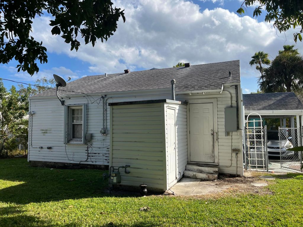 Photo of 729 Rockland Drive, West Palm Beach, FL 33405 (MLS # R11167051)