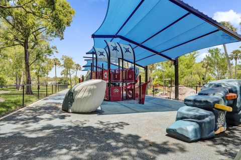 Tiny photo for 811 NW 43rd Avenue, Coconut Creek, FL 33066 (MLS # B26042029)