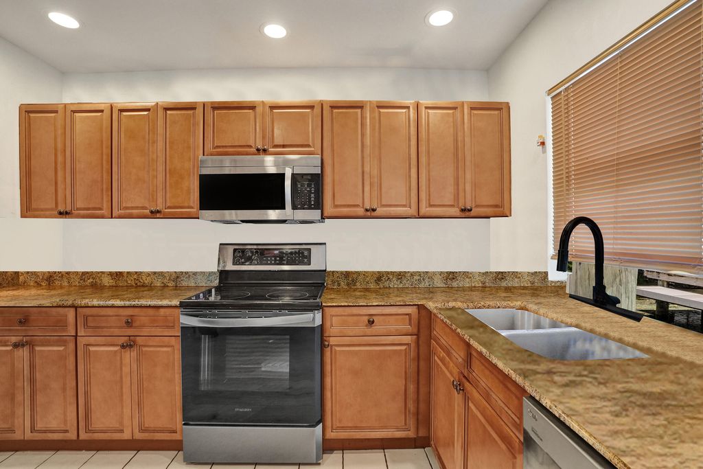 Photo of 811 NW 43rd Avenue, Coconut Creek, FL 33066 (MLS # B26042029)