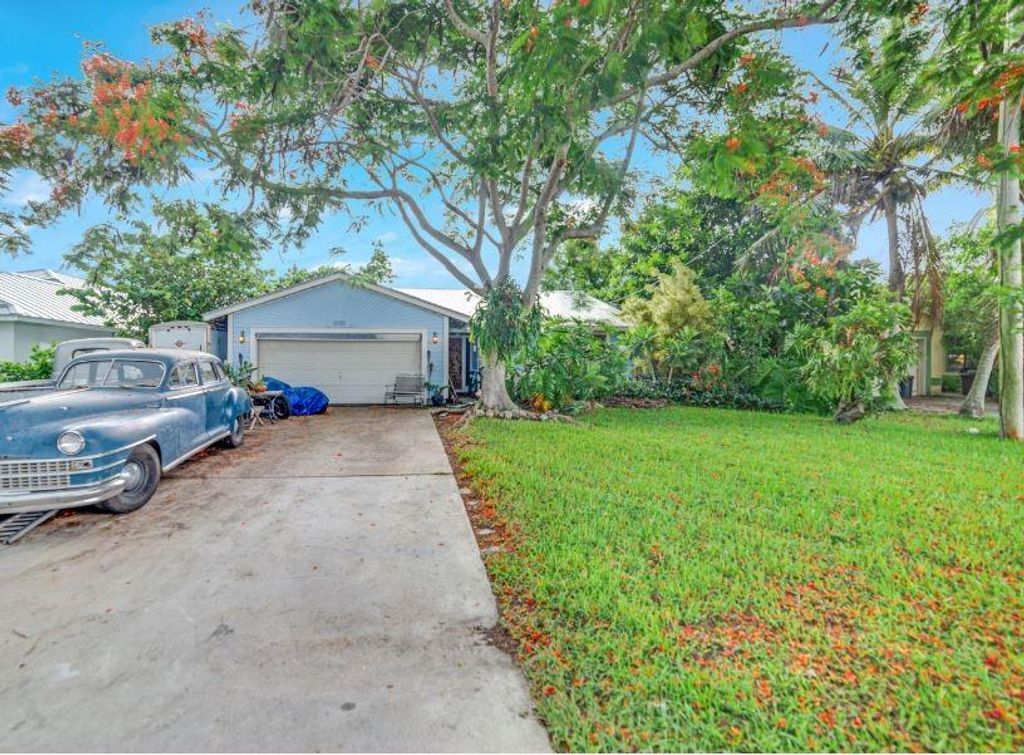 Photo of 6159 Lucerne St, Jupiter, FL 33458 (MLS # F10389168)