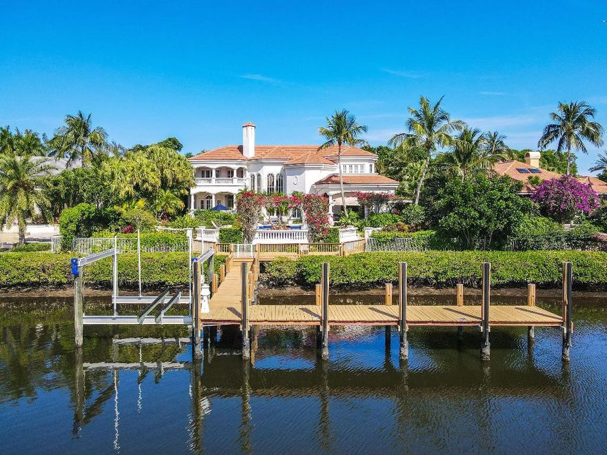 Outstanding custom estate located in the exclusive guard gated community of Admirals Cove. Sits on 110'  of water frontage with no fixed bridges. This timeless masterpiece features 5 BR/5.1BA + office, 9,101 Sg Ft soaring ceilings and spectacular water views from almost every room. Luxurious master suite with large sitting room, his & hers baths and walk-in closets. Gourmet kitchen. Step outside to be greeted by a  resort styled back yard with large pool & spa, lush landscaping. Brand new summer kitchen makes it perfect for entertaining and enjoying the beautiful sunsets and tranquil water views.FURNITURE INCLUDED.  Amenities: 45 holes of golf, 5 restaurants, 58 slip marina with floating docks, Yacht Club, Har Tru tennis courts, pickelball courts, and state of the art gym.