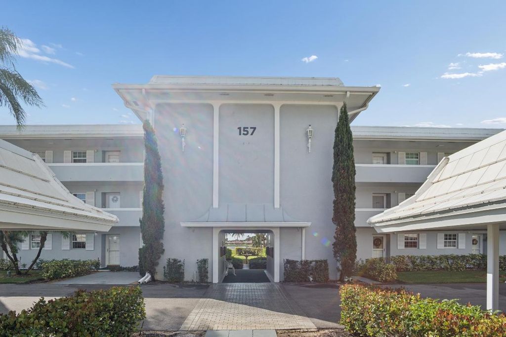 Photo of 157 Atlantis Boulevard #104, Atlantis, FL 33462 (MLS # R11143330)