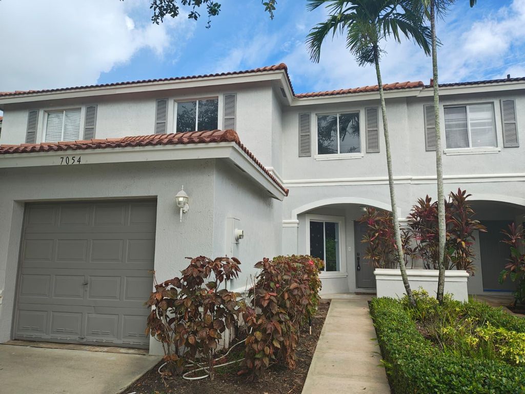 Photo of 7054 Hawks Nest Terrace, Riviera Beach, FL 33407 (MLS # R11128286)