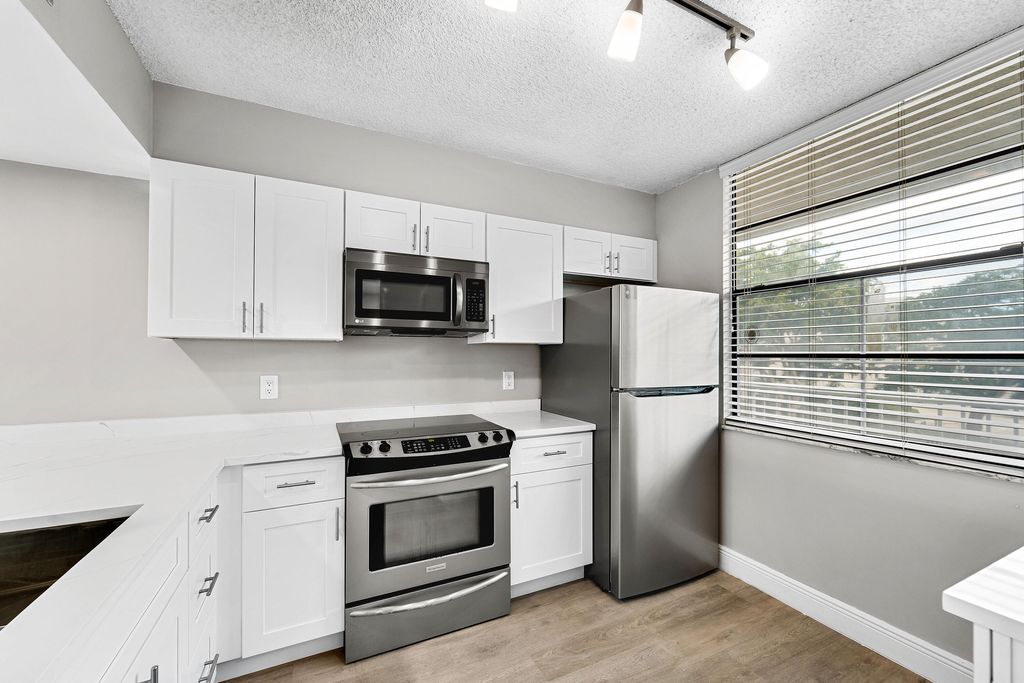 Photo of 3636 Whitehall Drive #402, West Palm Beach, FL 33401 (MLS # B26026439)