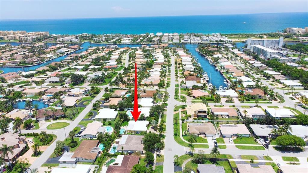 Pristine single family home sitting on a oversized lot with 3 bedrooms/2 full bath and attached garage. Located in 'The Cove' desirable intercostal community with no HOA, room for trailer or boat in the circular driveway and East of US-1. Minutes to Beaches. Enjoy this blank canvas with marble tiles throughout featuring a large gourmet kitchen with a lot of counter space and stainless steel appliances. Huge European style pool perfect for entertaining family and guests all year long! Lush landscaping, hurricane shutters, ready to move in! Make it yours today and come enjoy true South Florida living! Motivated seller