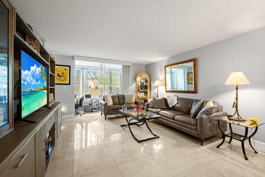 Photo of 9330 Sunrise Lakes Boulevard #104, Sunrise, FL 33322 (MLS # B26013450)