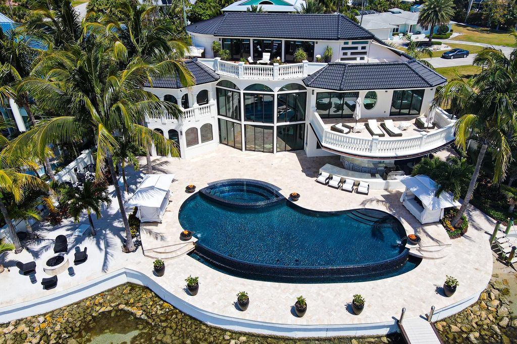 Photo of 1615 Thumb Point Drive, Hutchinson Island, FL 34949 (MLS # R11051599)