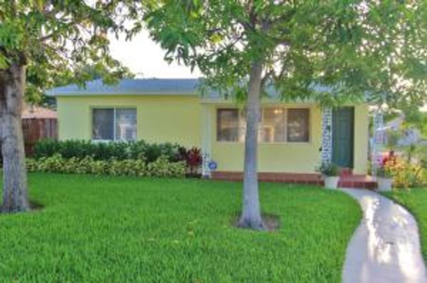 New, New, New - Beautiful house, yard and new totally remodeled upgraded custom kitchen w/ Stainless Steel appliances, Granite counter tops and Tumbled marble backsplash. Polished terrazzo floors, new windows, new central A/C and laundry are just some of the other features included. Exterior is freshly landscaped with tropical and fruit plants.  Located east of Federal in the highly desired Parrot Cove Neighborhood and close to all the activities of Downtown