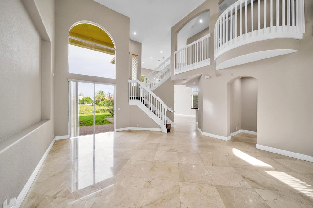 Photo of 12159 NW 75th Place, Parkland, FL 33076 (MLS # F10466881)
