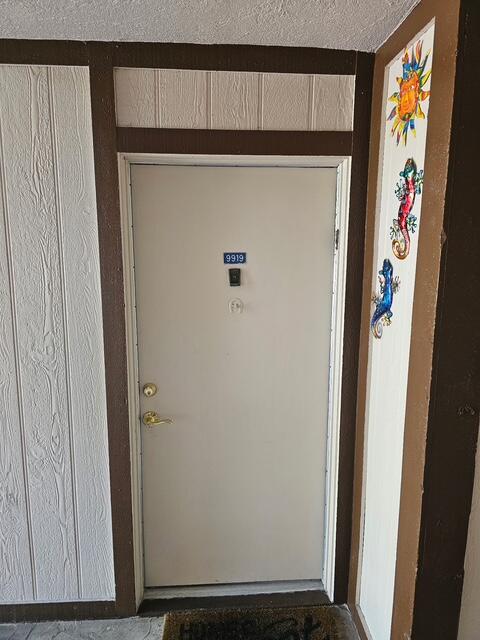 Photo of 9919 N Belfort Circle #105, Tamarac, FL 33321 (MLS # B26074588)