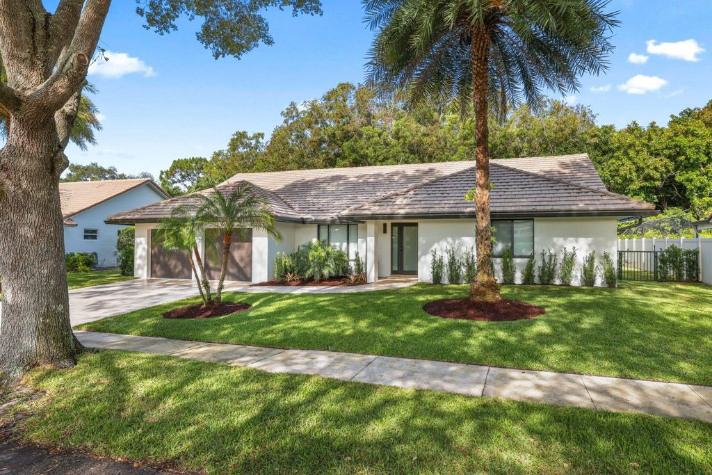 Photo of 3901 NW 27th Avenue, Boca Raton, FL 33434 (MLS # B26025609)