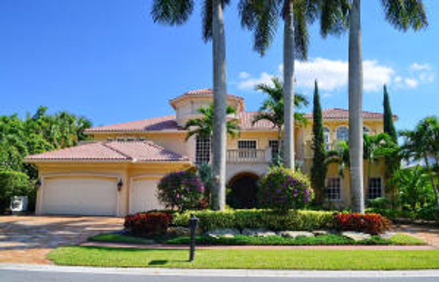 Classic Palm Beach inspired two story estate with six bedrooms, seven full baths and three half baths, features a formal living room, dining room, gentlemen's club room and cinema style home theater. A large gourmet kitchen with custom designed cabinets, granite countertops and cooking island is designed for the master chef and overlooks the family room and panoramic views. A luxurious master suite offers his and her baths. Other amenities include impact resistant windows, generator and 3 bay garage. The information herein is deemed reliable and subject to errors, omissions and changes without notice.  All measurements are approximate.