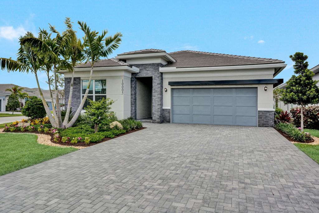Photo of 10238 Timber Creek Way, Palm Beach Gardens, FL 33412 (MLS # B26034731)
