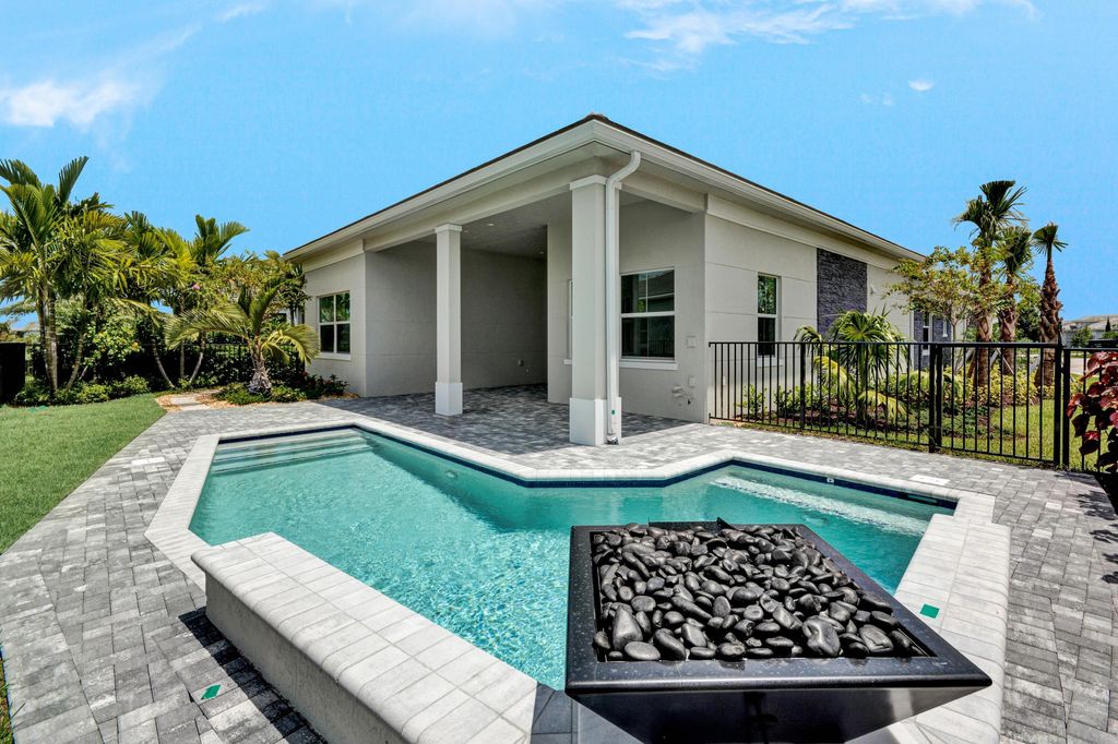 Photo of 10238 Timber Creek Way, Palm Beach Gardens, FL 33412 (MLS # B26034731)