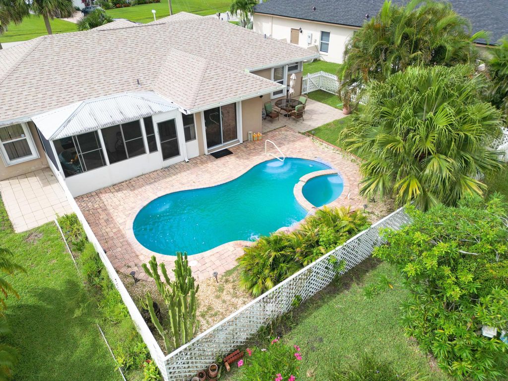 Photo of 6011 NW Winfield Drive, Port St Lucie, FL 34986 (MLS # R10908347)