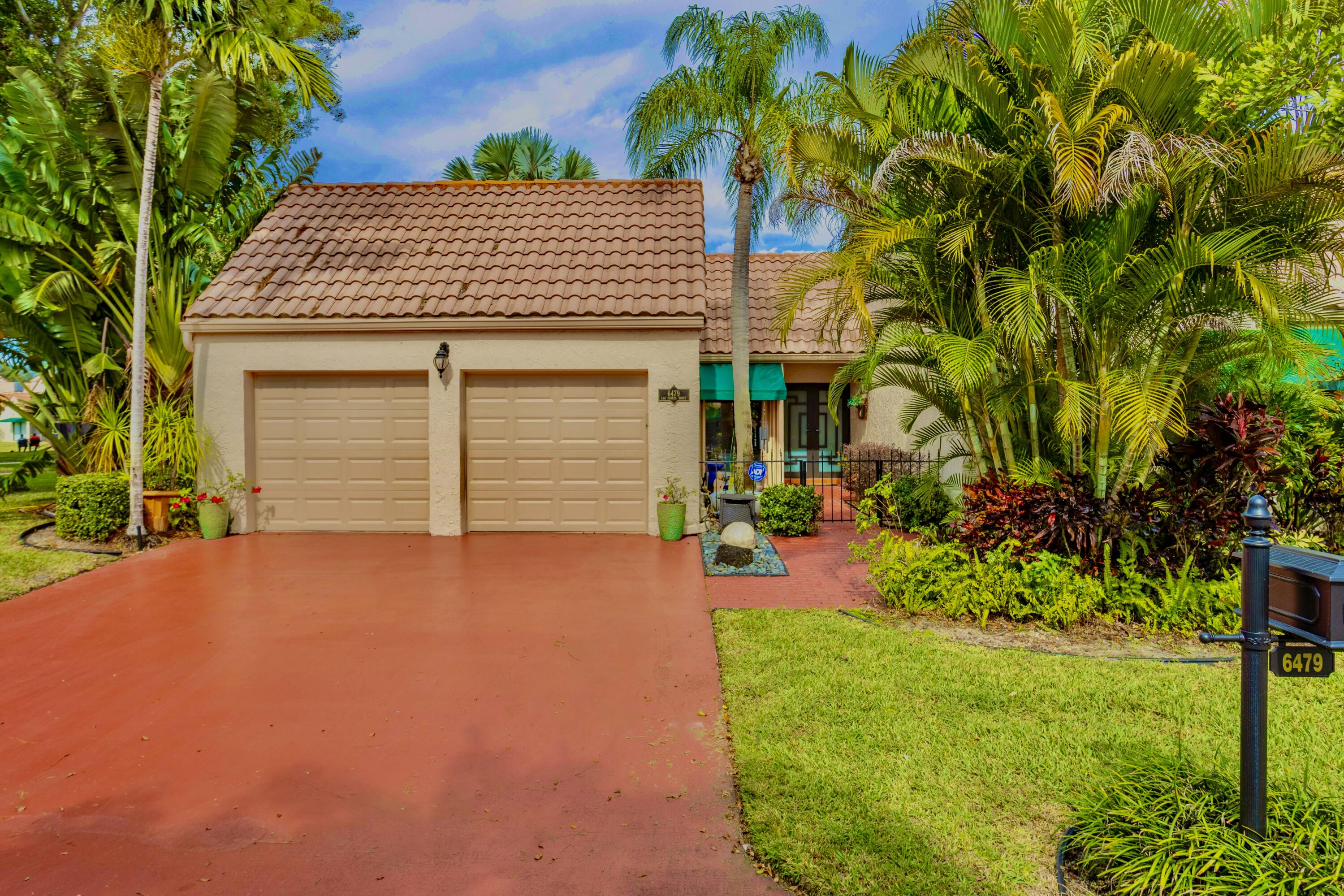 Welcome to the highly sought-after L Ambiance of Boca Raton! Boasting a large corner lot, this residence offers a spacious floor plan that is perfect for both everyday living and entertaining.The heart of the home is the impressive family room addition, seamlessly connected to the kitchen, creating a harmonious space for gatherings and creating lasting memories with loved ones.As you make your way through the home, you'll be captivated by the dining, living room & stunning private patio that overlooks the serene lake. Imagine sipping your morning coffee or hosting al fresco dinners while enjoying the tranquility and picturesque views that surround you.One of the many highlights of this property is its proximity to the pool as well as Verde Elementary, just a short walk away.