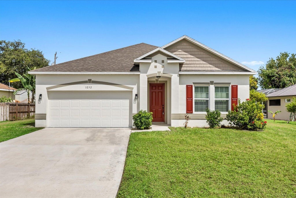 Photo of 3232 SE Quay Street, Port Saint Lucie, FL 34984 (MLS # B26071871)