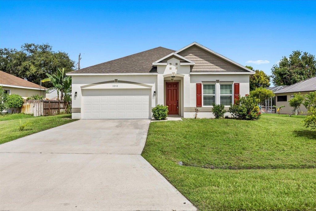 Photo of 3232 SE Quay Street, Port Saint Lucie, FL 34984 (MLS # B26071871)