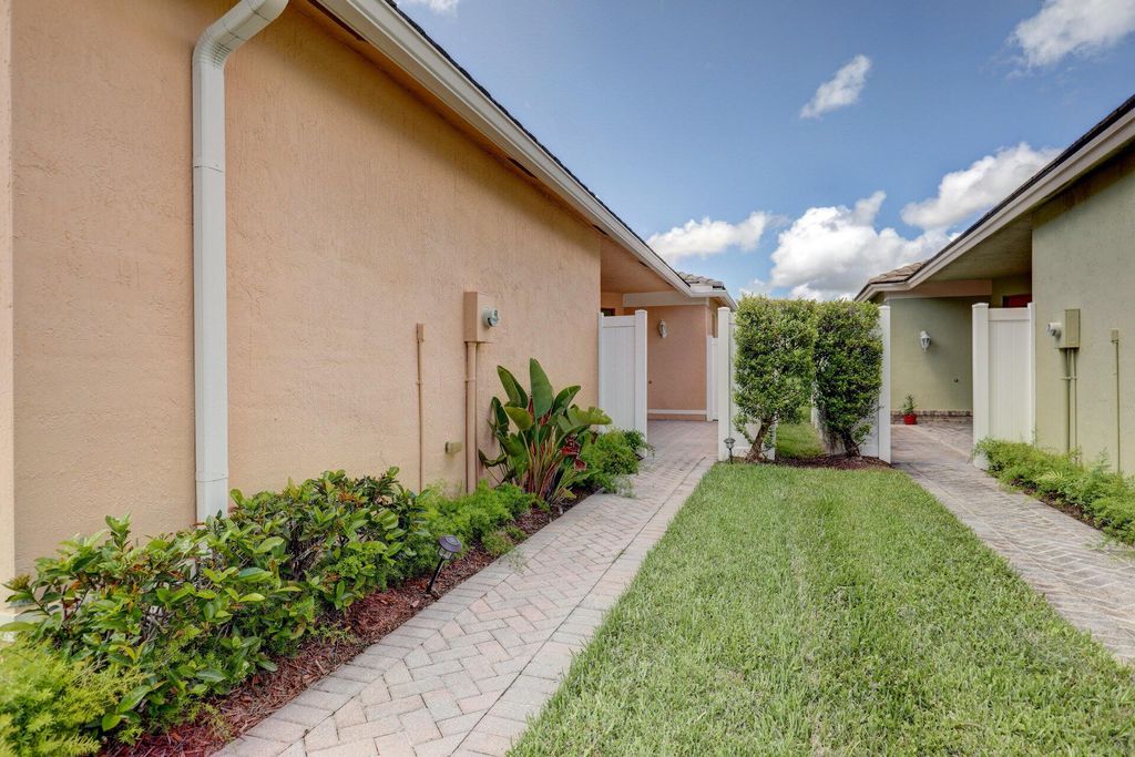 Photo of 9516 SW Flowermound Circle, Port Saint Lucie, FL 34987 (MLS # R11092748)