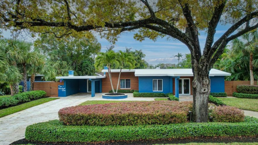 Welcome to luxury living in the heart of Wilton Manors. Beyond the mature oak trees, large circular driveway and grand entry, you will discover this special residence. Luxuriate in the outdoors on your covered patio or in your heated saltwater pool surrounded with beautiful landscaping and loads of travertine pavers on this oversized lot. Inside you will find a spacious, well connected living area, large kitchen with updated smart appliances and a dining room begging to host fabulous dinner parties. Lots of wonderful updates such as interior/exterior hardwired sound system, smart lighting, smart sprinkler system and all impact windows/doors. You’ll love the extra-large storage room and generous laundry/office to keep all your stuff tucked away.