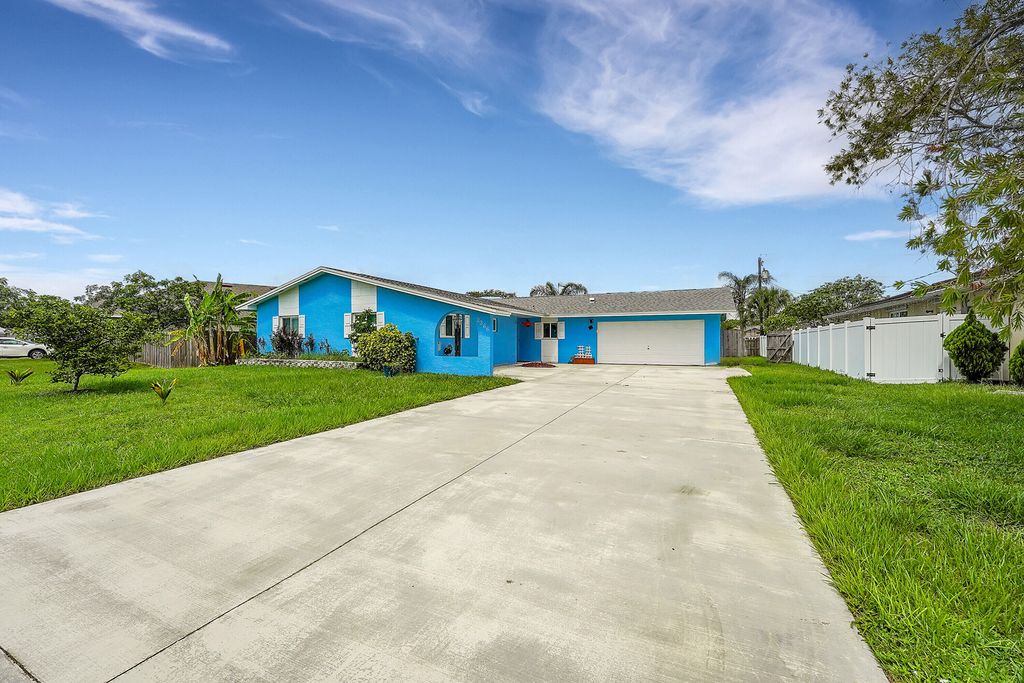 Photo of 2366 SE Corsica Road, Port Saint Lucie, FL 34952 (MLS # R11000238)