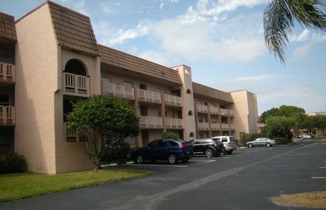 55+ Community, 2/2 Ready to move in, 1st floor corner unit with convenient parking. Tile and laminate floors throughout, remodeled kitchen, impact windows, great water views from screened in patio with accordion shutters.
Private entrance. Furniture offered for sale separately. Patio has great water views. Roof assessment to be paid at closing by Seller. Ready for you to move right in! MAIN CLUBHOUSE, SAUNAS, BBQ, PICNIC AREAS, BILLIARDS, THEATER, CABANAS, COURTESY BUSSES, INDOOR AND OUTDOOR POOLS AND FITNESS ROOM IN THE SOUGHT AFTER SUNRISE LAKES PHASE III. JUST LISTED, WON'T LAST!