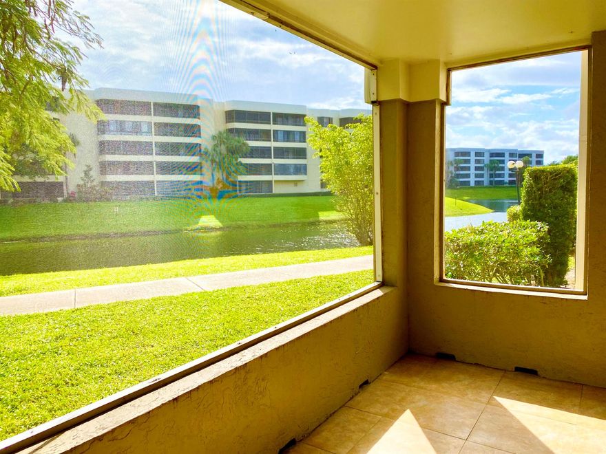 Spectacular lake views from light & bright, remodeled 1st floor corner unit. Screened patio, Ceramic tile floors, Kitchen has granite counter tops, stainless appliances, full size washer / dryer & Storage closet. Gated Resort Style Community with clubhouse, state of the art gym, pool / spa on the lake, tennis courts, volley ball, basket ball, Walking paths, car wash station, etc. LOCATION, LOCATION, LOCATION., Mins. to beach, I-95, Downtown Delray, FAU, Mizner Park, Malls, Tpke, Shopping, Restaurants & Entertainment!!! Won't Last...