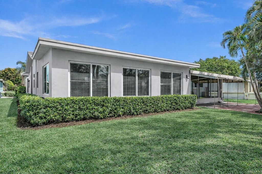 Photo of 4504 NW 47th Terrace, Tamarac, FL 33319 (MLS # B26002187)